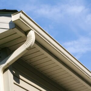 A view from below of a completed gutter and draining project on a residential home by The Exterior Company.