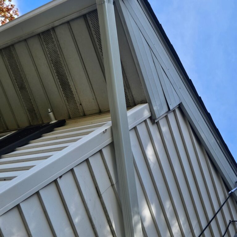 View up from the ground of a new gutter installed by The Exterior Company