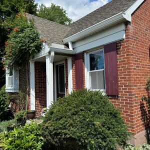 Ground view of a residential home with new gutter system installed by The Exterior Company