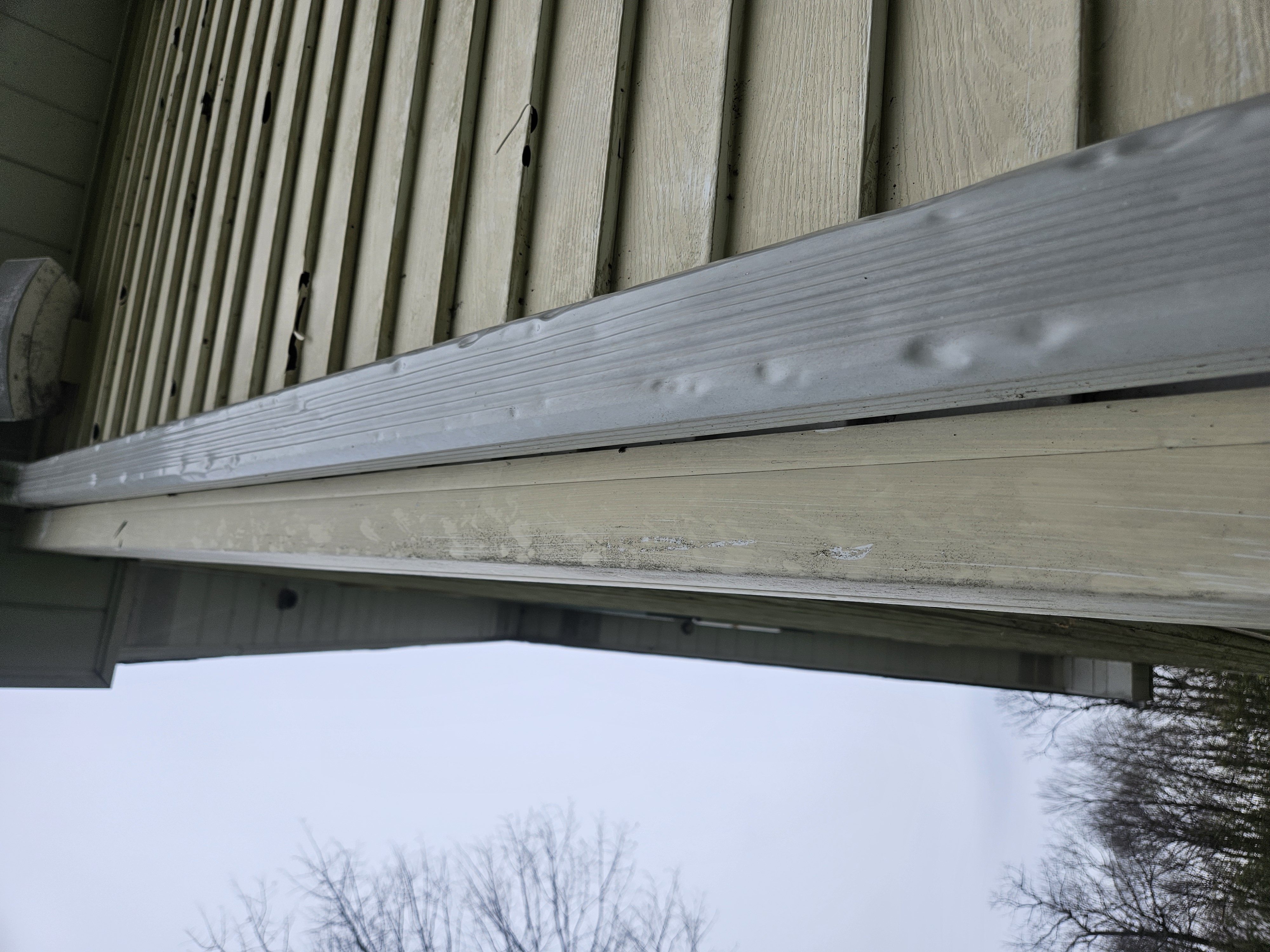 Hail punch-through holes in vinyl siding panels and fascia