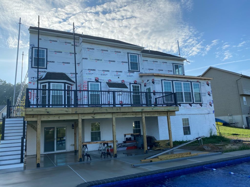 Hanover, PA siding installation progress, with some of the new vinyl siding visible