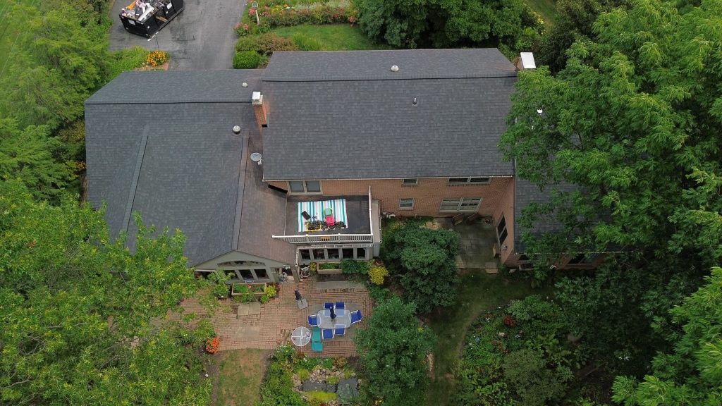Storm damaged roof replace by The Exterior Company in Leola, PA